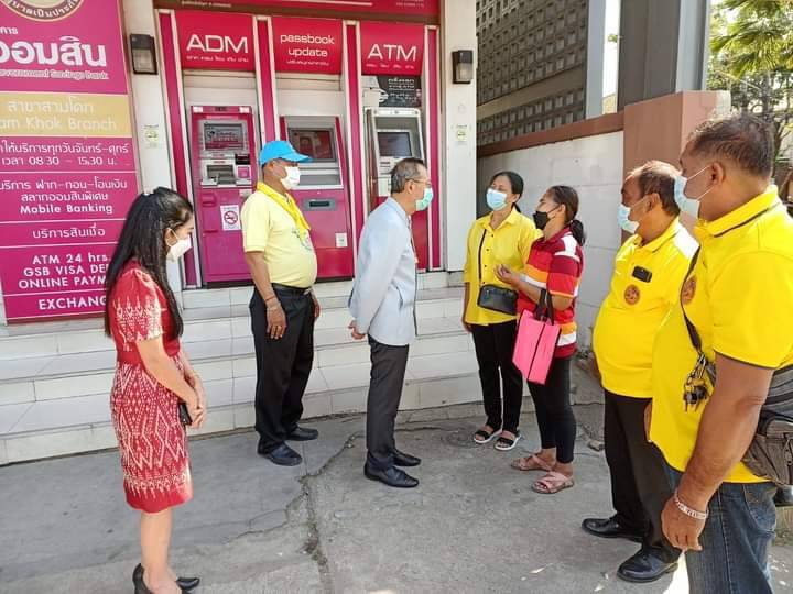 ปทุมธานี ชาวสามโคก ปทุมธานี ยิ้มร่า กดเอทีเอ็มรับเงินช่วยเหลือน้ำท่วมก่อนใคร